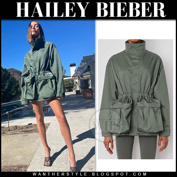 Hailey Bieber in green parka and green sandals