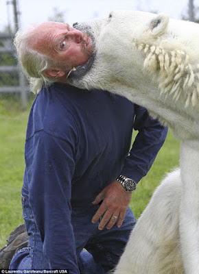 Mark bravely lets Agee clamp her jaws around his head