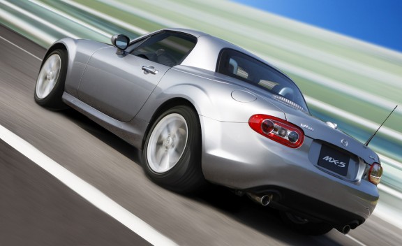 Silver 2011 Mazda MX-5 Miata Grand Touring PRHT driving shot