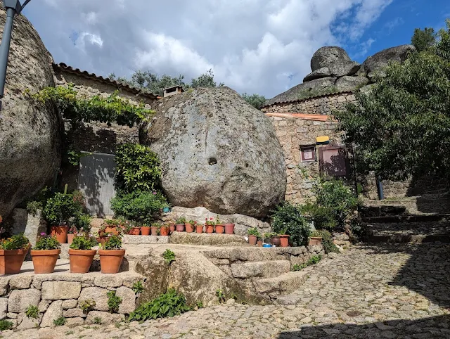 Boulder incorporated into a house in Monsanto Portugal