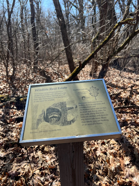 Signs on the nature trail provide information about what can be discovered at the preserve.