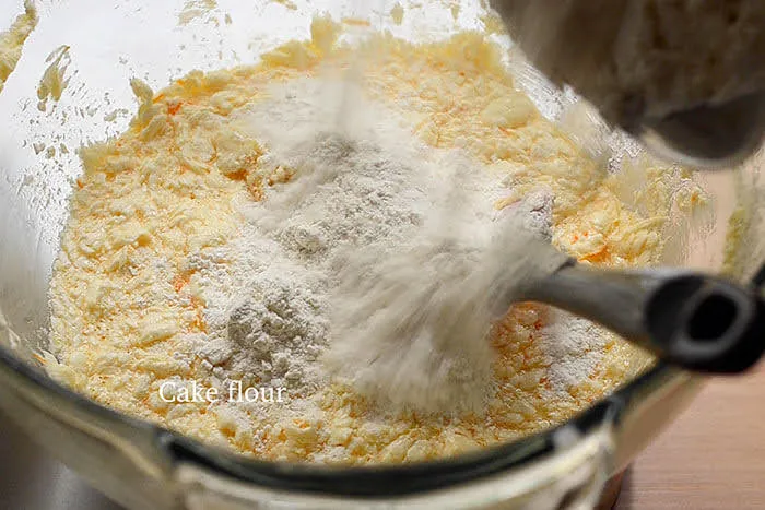 Add Cake flour to creamed egg and butter