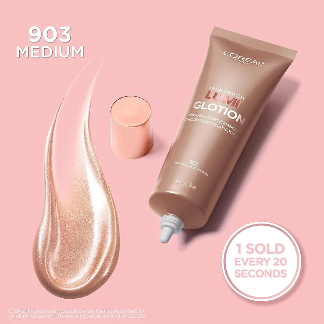 a small cap, l,oreal makeup glotion tube, and liquid of glotion