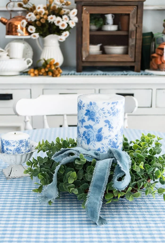 blue and white floral candles, gingham tablecloth, ironstone
