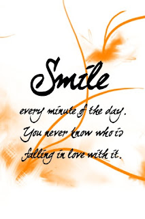 A white background with writing in a warm orange almost rust color that says Smile every minute of the day. You never know who is falling in love with it.