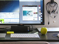 MacBook charging peacefully beside my PC desktop