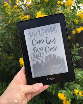 Riley Thorn and the Dead Guy Next Door by Lucy Score | About That Story