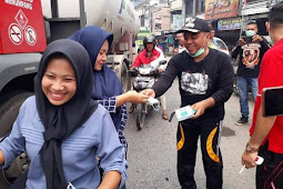 Diselimuti Kabut Asap, Plt Bupati Labuhanbatu Membagikan Masker Secara Gratis 