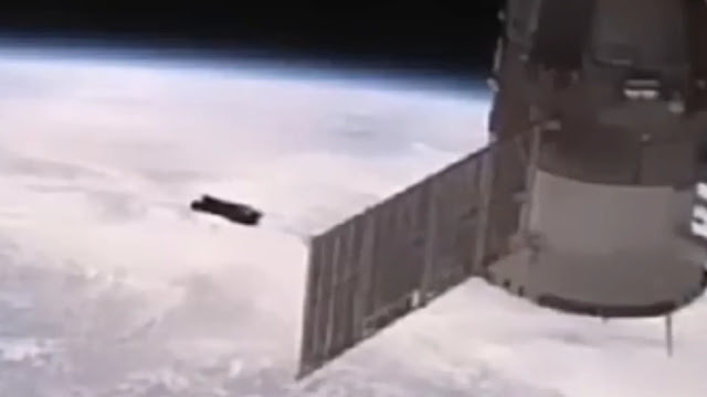 A close up of the UFO sneaking past the ISS on live feed cameras.