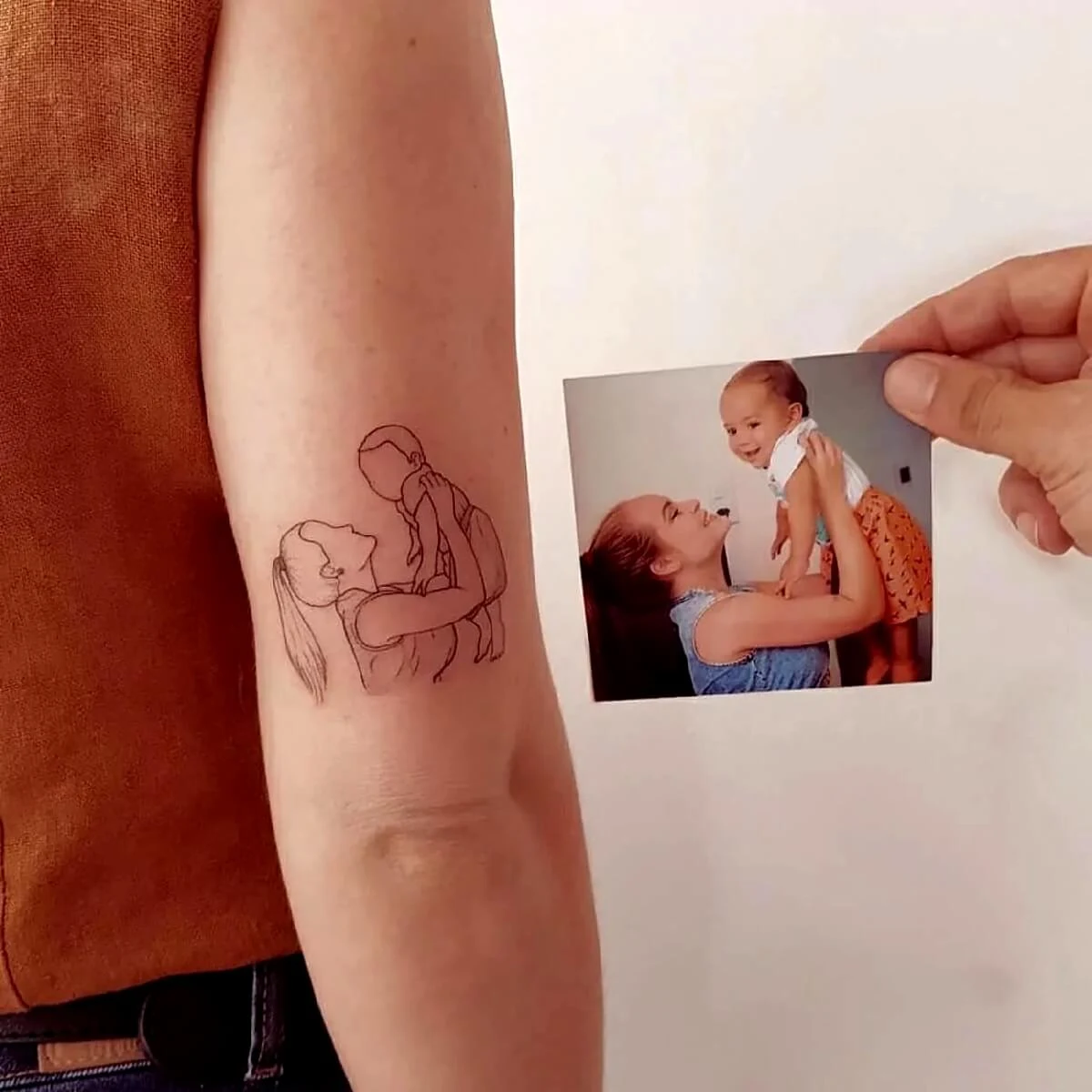 Ideias Criativas de Tatuagem Mãe e Filho Delicada