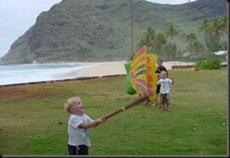 Jonas hitting pinata