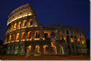 The Colosseum in Rome by night, looking impressive with the illuminations