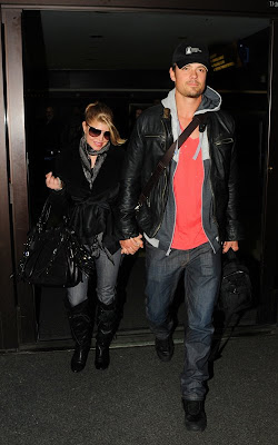 Fergie and Josh Duhamel arriving at LAX Airport