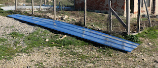 Four meter lengths of corrugated metal for the roof of the chicken house