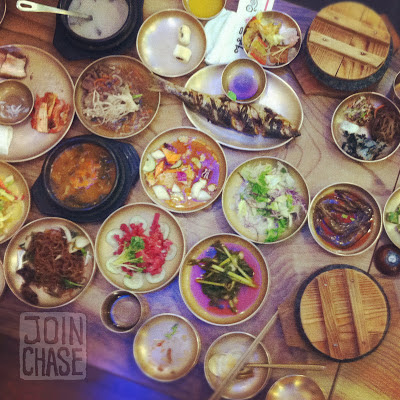 A variety of Korean food served in bronzeware during a traditional Korean meal in Cheongju, South Korea.