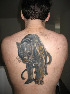 Panther tattoo on back.