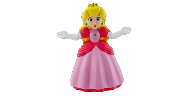 Brinquedo da Princesa Peach com as mãos levemente levantadas.