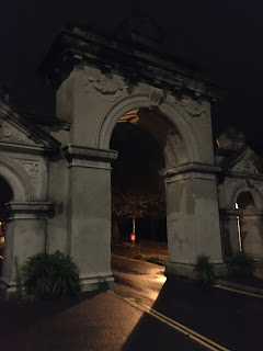 Queen's Park entrance at night