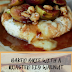 BAKED BRIE WITH A ROASTED FIG WALNUT HONEY TOPPING