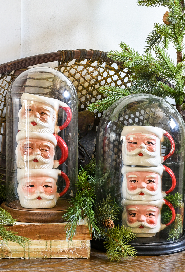 vintage Santa mugs in wood cloche