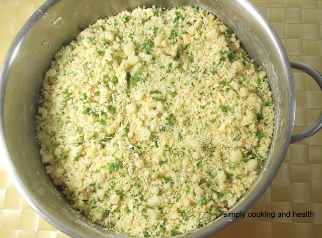 Kale and carrot is added to couscous