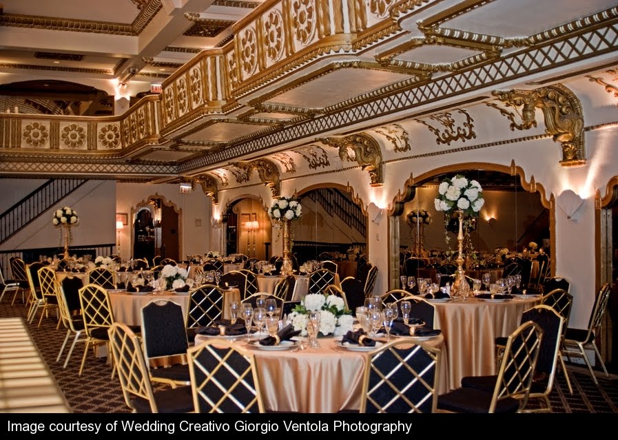 The bride chose elegant tall and low centerpieces made of white hydrangea by