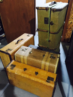 Old suitcases waiting to be on display at Offbeat Avenue Boutique!