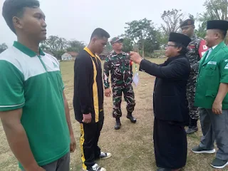 Pendidikan dan Latihan Dasar Banser Angkatan I Periode VI di lapangan Desa Purwosari, Kecamatan Marga Sekampung, Kabupaten Lampung Timur pada Jumat, 24 November 2023.