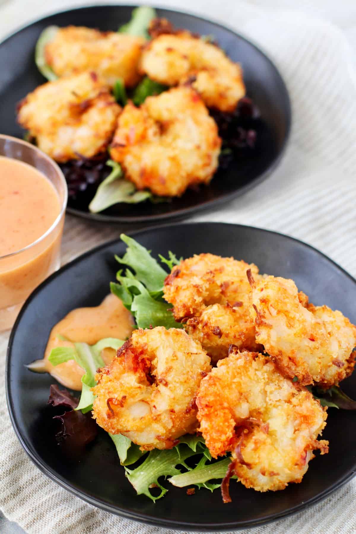 Air Fryer Crispy Coconut Shrimp on individual plates.