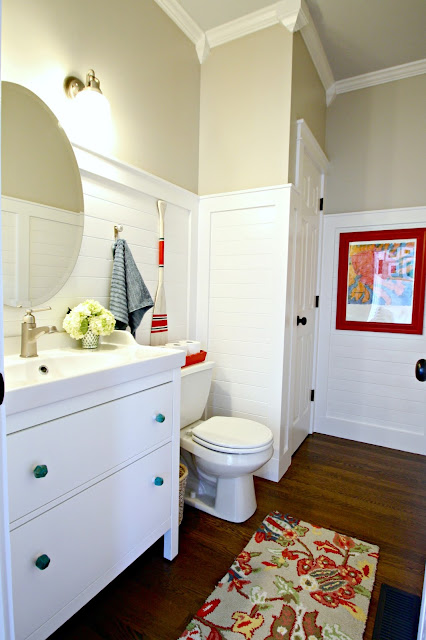 planked white walls in bathroom