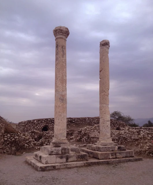 The two high columns in Bishapur, known as the memorial monuments.