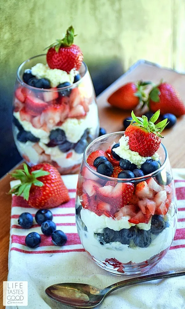 Red, White, and Blue Parfaits | by Life Tastes Good make the perfect dessert for our holiday weekend. The patriotic colors bring that festive feel, and because these parfaits are made with less carbs, we can enjoy this tasty holiday treat without all the guilt! #SundaySupper