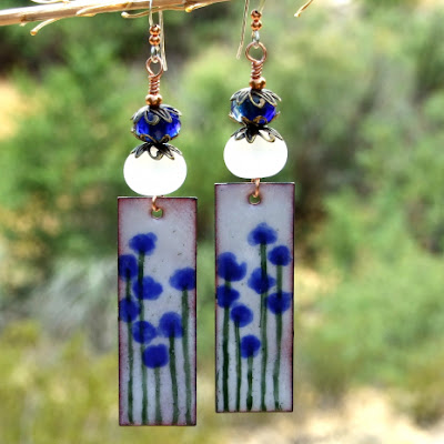 enamel blue flower dangle earrings glowing lampwork beads