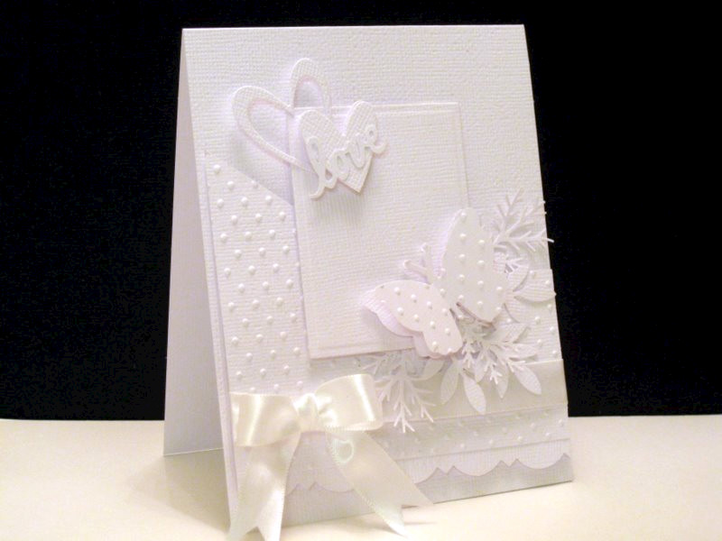 I thought I would make this card a white on white winter wedding card