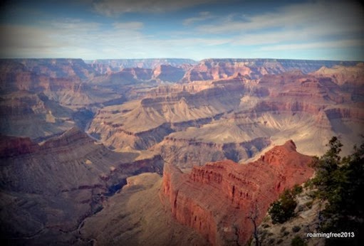 The sun shining on the canyon