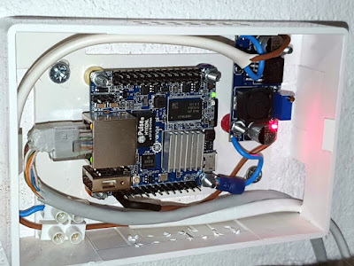 Orange Pi installed in a plastic box, with power supply module