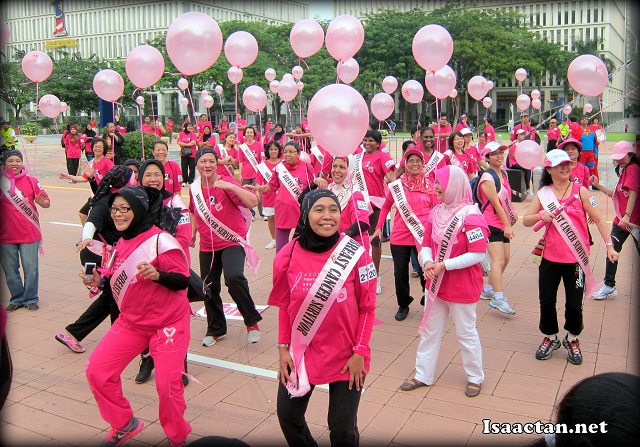 Breast Cancer Survivors dancing to the music before the run