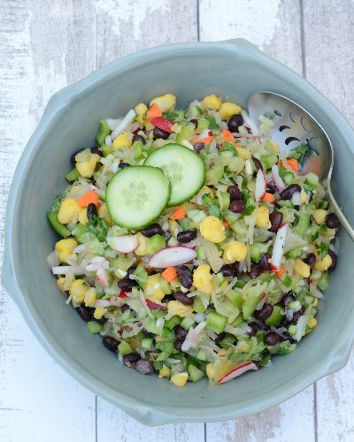 Sauerkraut Salad, another healthy salad ♥ KitchenParade.com, lightened, brightened with vegetables, hominy, black beans. Vegan. Gluten Free. Weight Watchers Friendly.