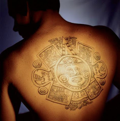 Beautiful Aztec symbol tattoo on the back.