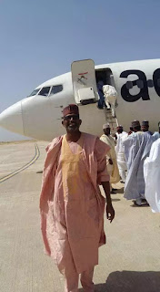 Aero passengers disembarking aircraft with ladder