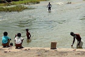 children playing in river