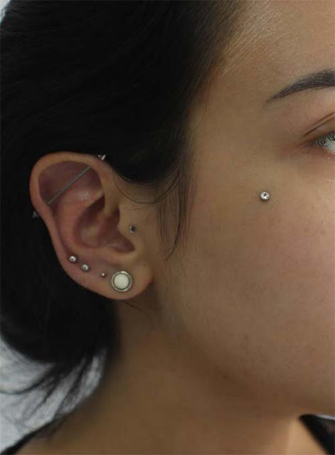 Snake Bite Piercing On Ear