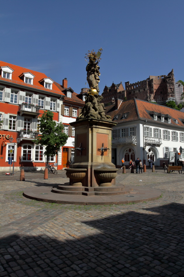 Statue at Marketplatz and Heidelberg Castle in the background