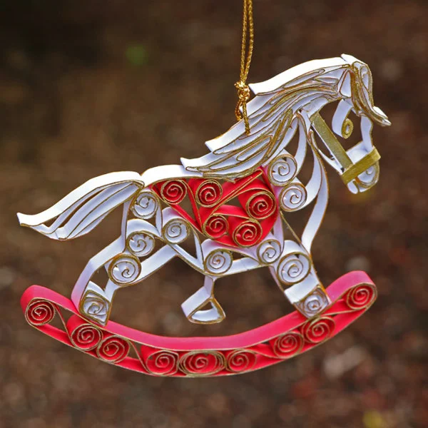 white, red, and gold quilled rocking horse tree ornament