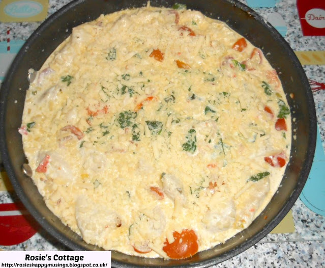 Delicious Diced Chicken With Tomato & Spinach In A Creamy Cheesy Sauce - Remove from the heat and add some lovely grated cheese and a sprinkle of Italian herbs to the top...