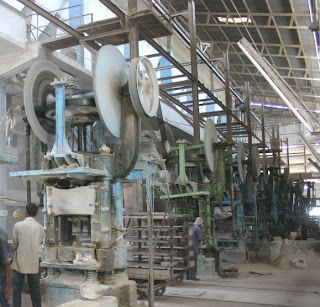 An array of Friction Screw Presses in a Refractory Plant image