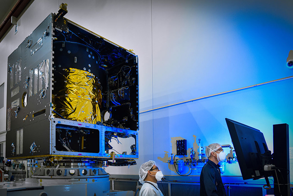 At Maxar Technologies in Palo Alto, California, technicians power on the main body of NASA’s Psyche spacecraft, also known as the Solar Electric Propulsion Chassis, in November of 2020.