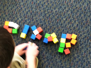 Spelling with cubes (Brick by Brick)