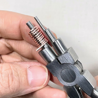 making a wire coil on 6 step mandrel pliers