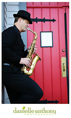 saxophone player & red door